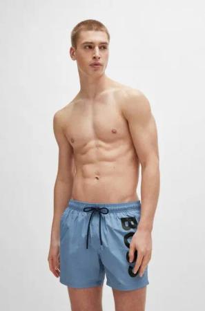 BOSS Badeshorts Octopus mit kontrastfarbenem BOSS Logo-Schriftzug auf dem Bein