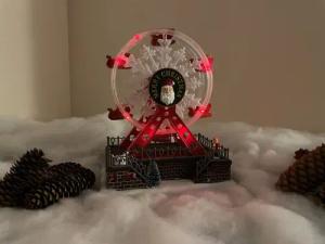 e4fun Dekofigur Weihnachtsdorf: Riesenrad mit LED, Musik, drehendem Riesenrad, Musik (1 St)