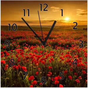 Wallario Wanduhr Mohnblumenwiese bei Sonnenuntergang am Abend (Glasuhr)