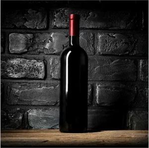 Wallario Möbelfolie Rotwein-Flasche am Abend