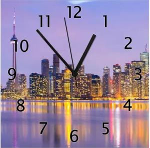 Wallario Wanduhr Toronto Skyline - Kanada am Abend (Glasuhr)