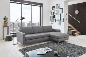 Die PlanBar Ecksofa "MP-IN19027 L-Form", wahlweise mit Bettfunktion, frei im Raum stellbar