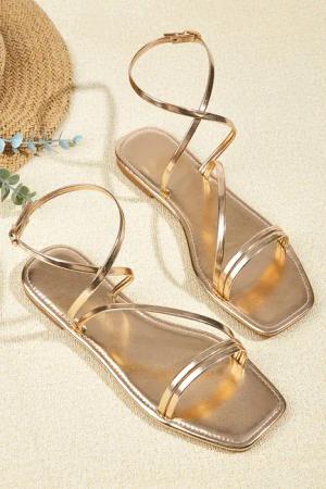 Kunstledersandalen im Goldton