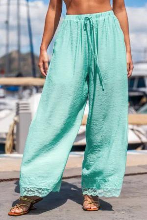 Grüne Strandhose mit Spitzenbesatz