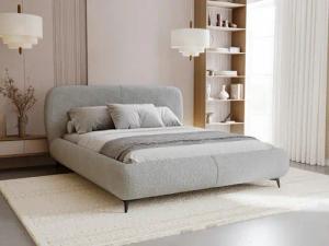 Compleo Polsterbett mit gepolstertem Kopf- &