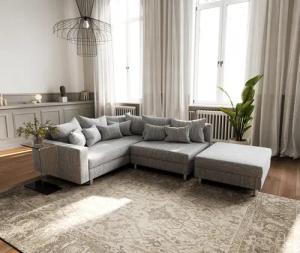 DELIFE Ecksofa Clovis, Hellgrau Strukturstoff mit