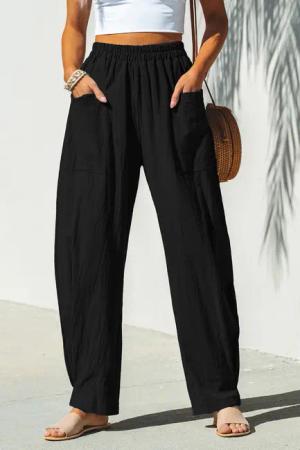 Schwarze Hose mit spitz zulaufendem Bein und elastischer Taille