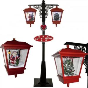 MONOPOL® LED Laterne Schneiende LED Doppel-Laterne 195 cm rot mit Weihnachtsmann u. -baum